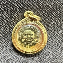 หลวงพ่อทวดเม็ดแตงเนื้อทองคำ no.14 เลี่ยมทอง