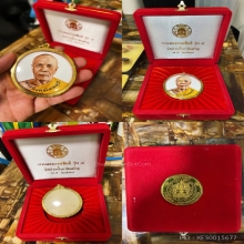 พระของขวัญล๊อกเก็ตกลมหลวงพ่อสดวัดปากน้ำปี 2514