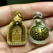 พระปิดตาหลังนางกวัก งาแกะ หลวงพ่อเดิม วัดหนองโพธิ์