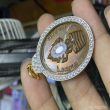 เหรียญนาคปรก ๘ รอบ หลวงปู่ทิม วัดละหารไร่ เลี่ยมทองเพชรCZ