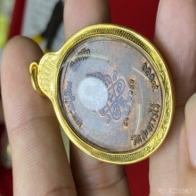 เหรียญนาคปรก ๘ รอบ หลวงปู่ทิม วัดละหารไร่ เลี่ยมทองเพชรCZ