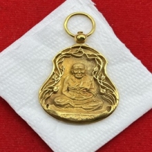 พระทองคำ.ฉลุโบราณหลวงปู่ทวด หลังพระนามาภิไธย สก.2544