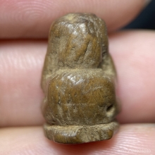 พระปิดตาไม้แกะเก่า ใต้ฐานอุดกระดาษสา ขนาดเท่าเหรียญ50สตางค์