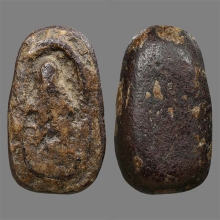 พระปิดตาเนื้อผงคลุกรักเก่า