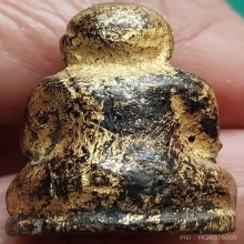 พระปิดตาไม้แกะปิดทองเก่า มีตลับเงิน