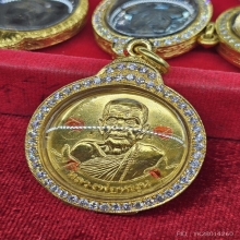 เหรียญหมุนเงินหมุนทอง หลวงปู่หมุน เนื้อทองคำ