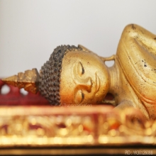 พระบูชาปางไสยยาสน์ เนื้อไม้ เกตุเป็นรักปั้น อายุเป็น 100 ปี