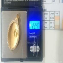 ตลับทอง90 เพชรแท้ เหรียญรูปไข่ 22.47 กรัม