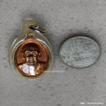 เหรียญเม็ดแตง หลวงปู่ดุลย์ วัดบูรพาราม จ สุรินทร์ ปี 2526