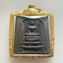 หลวงพ่อกวย พิมพ์ฐานสิงห์ เนื้อผงใบลาน  พ.ศ.2522