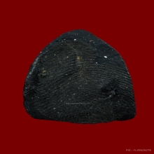 พระหลวงพ่อโต วัดรางจระเข้ เนื้อผงสีดำผสมผงใบลาน