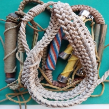 เชือกคาดเอว + ตะกรุด