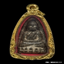 หลวงพ่อทวดเนื้อว่านรุ่นแรก พิมพ์กลางหน้ากลม ปี.2497