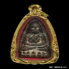 หลวงพ่อทวดเนื้อว่านรุ่นแรก พิมพ์กลางหน้ากลม ปี.2497