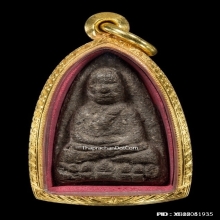 หลวงพ่อทวดเนื้อว่านรุ่นแรก พิมพ์กลางหน้ากลม ปี.2497