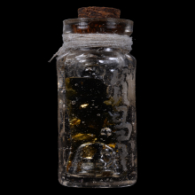 กุมารทองในขวดน้ำมันหลวงพ่อจงปี 2490