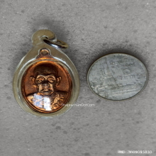 เหรียญเม็ดแตง หลวงปู่ดุลย์ วัดบูรพาราม จ สุรินทร์ ปี 2526