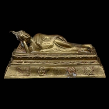 พระพุทธรูปปางไสยาสน์ หลวงพ่อแพ เนื้อทองเหลือง