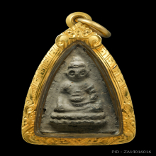 พระพุทโธน้อย พิมพ์เล็ก หน้าตุ๊กตา ไหล่จุด  เนื้อดินผ่านใบลาน