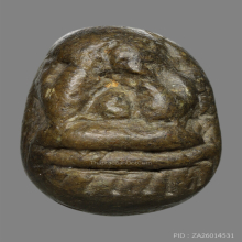 พระปิดตาเนื้อผงคลุกรักเก่า