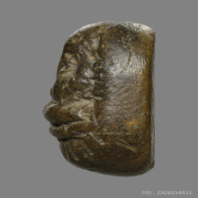 พระปิดตาเนื้อผงคลุกรักเก่า