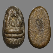 พระปิดตาเนื้อผงคลุกรักเก่า