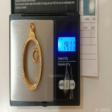 ตลับทอง90 เพชรแท้ เหรียญรูปไข่ หนัก 14.11 กรัม