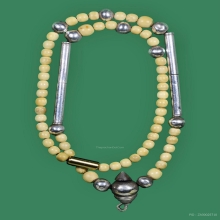 ตะกรุดเพชรหลีก-มหารูดน้อย เนื้อเงิน หลวงพ่อกวย สร้อยประคำงา