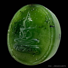 เหรียญหยกพระแก้วมรกตหลังวัดพระแก้วเชียงรายปี 2534