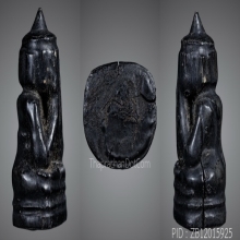 พระปิดตาไม้แกะหลวงพ่อขริก วัดสาวชะโงก