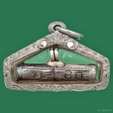 ตะกรุดนารายณ์แปลงรูป อ.นอง วัดทรายขาว เนื้อเงิน ปี 2535