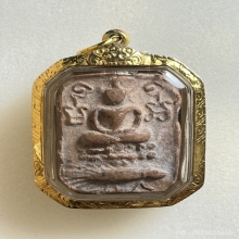 หลวงพ่อปาน พิมพ์ทรงเม่นบัว 8 จุด  เนื้อดินเผา พ.ศ. 2460