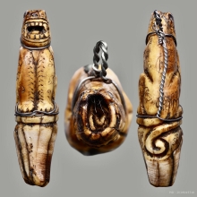 เขี้ยวหมีแกะเสือสอดหนังหน้าผากเสือ หลวงพ่อกวย วัดโฆสิตาราม 