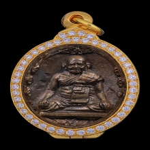 เหรียญหล่อโบราณ รุ่นแรก หลวงปู่หงษ์ เนื้อนวฤทธิ์ ปี2544