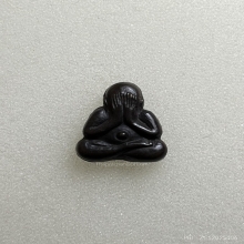 พระปิดตาหลังรูปเหมือนหลวงปู่ทิม เนื้อนวะ พ.ศ.2517