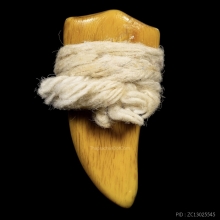 งาช้างแกะเป็นเขี้ยวเสือ 