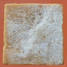 ลพ.กวย เนื้อผงน้ำมันหลังเรียบ ปี 15 ขนาด 1.6  x 2.2 ซม.