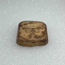 หลวงพ่อปาน พิมพ์ทรงนกสมาธิ เนื้อดินเผา พ.ศ. 2460