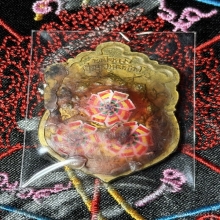 เหรียญเลื่อนสมณศักดิ์ เหนือดวง