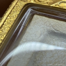 พระคำข้าวรุ่นแรกแขนจุดบัวจุดเดียวเกศาเลี่ยมทอง