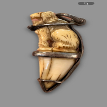 เขี้ยวเสือแกะเลี่ยมเงินโบราณ