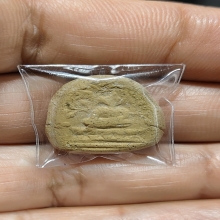 พระพิมพ์มารวิชัยหลังเบี้ยหลวงปู่พริ้งวัดบางปะกอก ปี2459