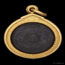 เหรียญหลวงปู่อี๋ หลังยันต์ใยแมงมุม 2483