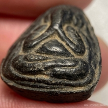 พระปิดตา เนื้อผงคลุกรักเก่า 