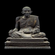 หลวงปู่ศุข รุ่นสร้างวิหาร ปี 31 เนื้อโลหะรมดำ หน้าตัก 5 นิ้ว