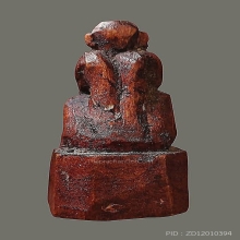 พระปิดตานั่งยองไม้แกะ 