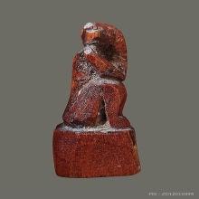 พระปิดตานั่งยองไม้แกะ 