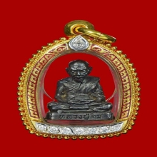 รูปหล่อไตรมาส หลวงปู่ทิม เนื้อนววะ ปี 2518