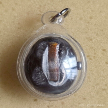 เบี้ยแก้ หลวงพ่อเกษม เขมโก รุ่นสุริยุปราคา ปี 38