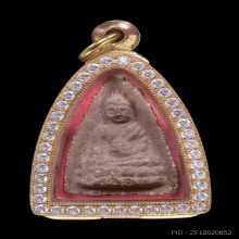 48.พระพุทโธน้อย พิมพ์กลางเกศตุ้ม เนื้อปูนแดงผสมผง ปี 2494